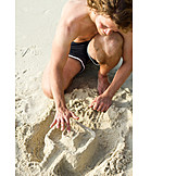   Young man, Sandcastle, Beach holiday