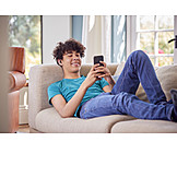   Teenager, Sofa, Relaxed, Online, Smart Phone