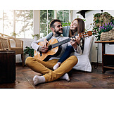   Couple, Home, Music, Playing Guitar