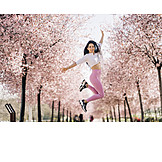   Young Woman, Energy, Vitality, Jumping, Almond Blossom