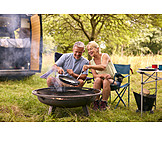   Cooking, Camping, Older Couple
